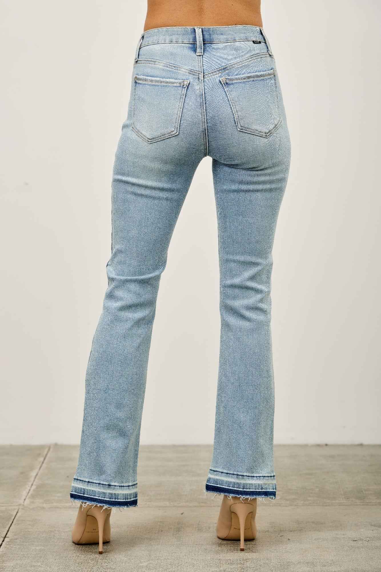 Mid Rise Flare With Released Hem
